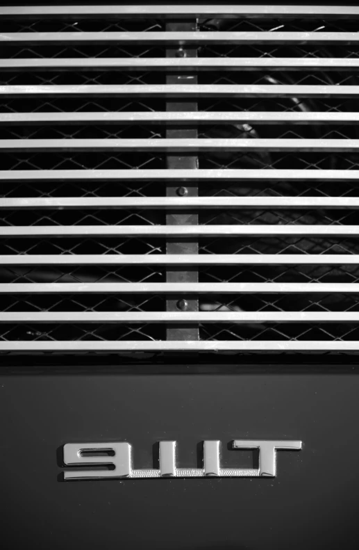 black and white po of the side grille of an automobile