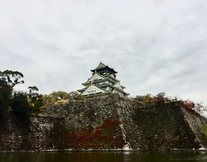 there is a very tall tower over looking the water