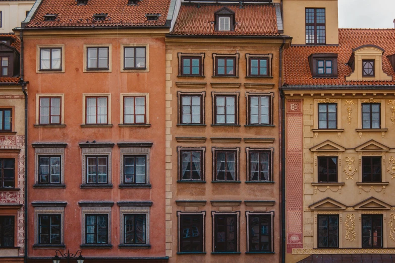 old buildings with large windows and tiled roof