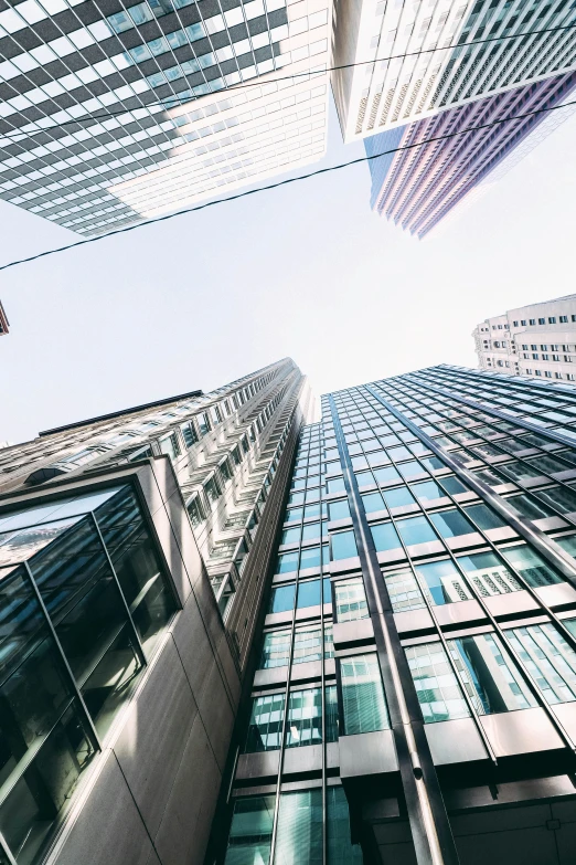 looking up at some tall buildings