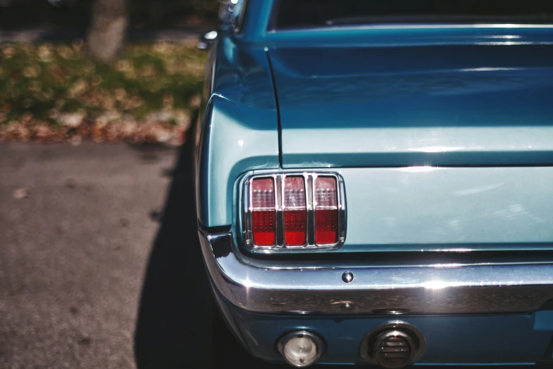 a close up of the rear end of a mustang