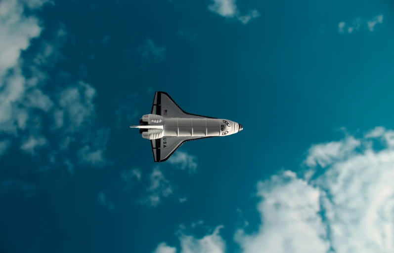 a rocket is ascending in the air with a sky background
