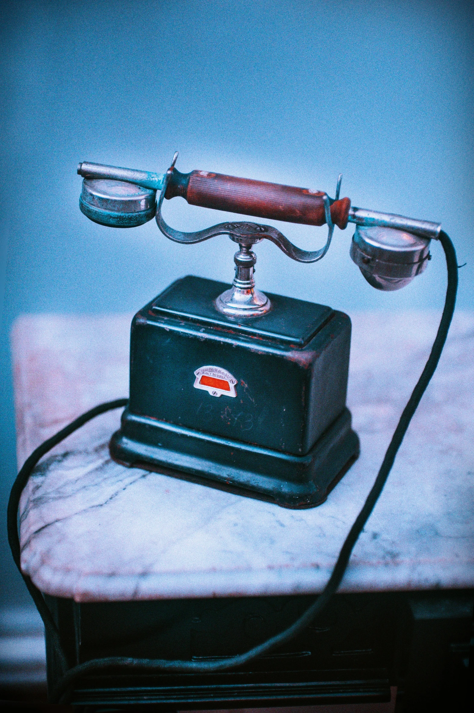 a close up of an old fashioned telephone