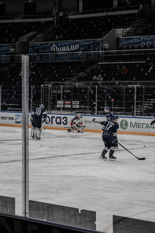 a hockey player is getting ready to shoot the puck