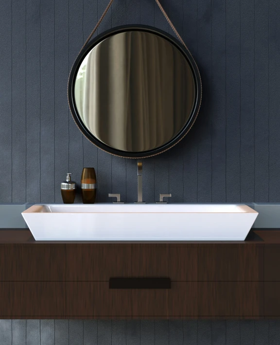 a modern sink and mirror against a dark wall