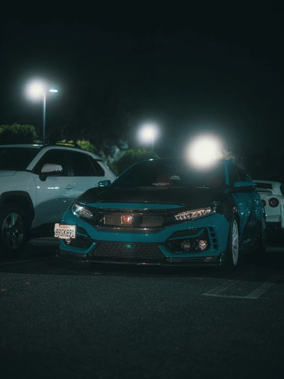 two cars parked on the street next to each other