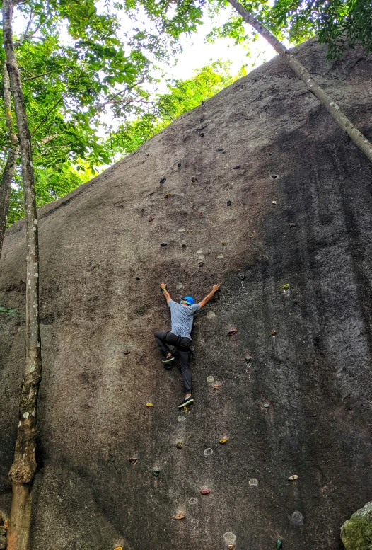 a young man is falling down on top of a hill