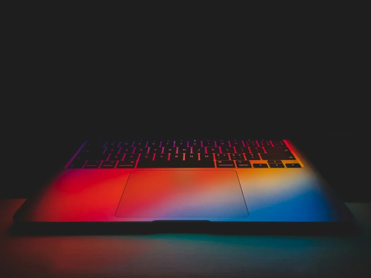 the macbook pro is turned on in the dark