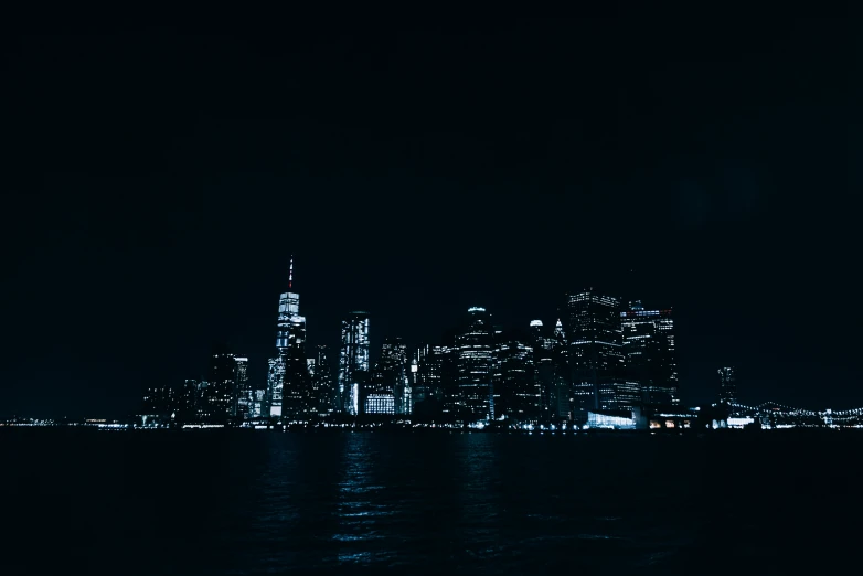a large city skyline on a dark night