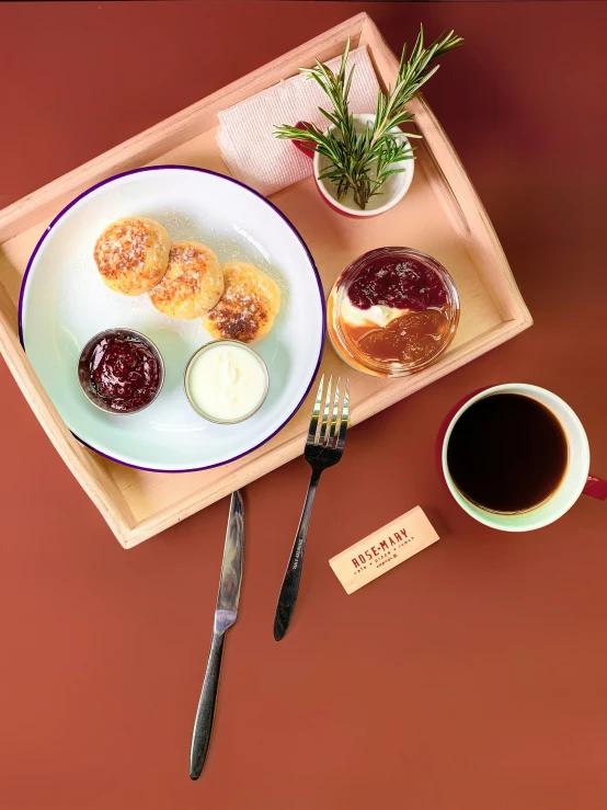 pastry items served on serving tray with cup of coffee