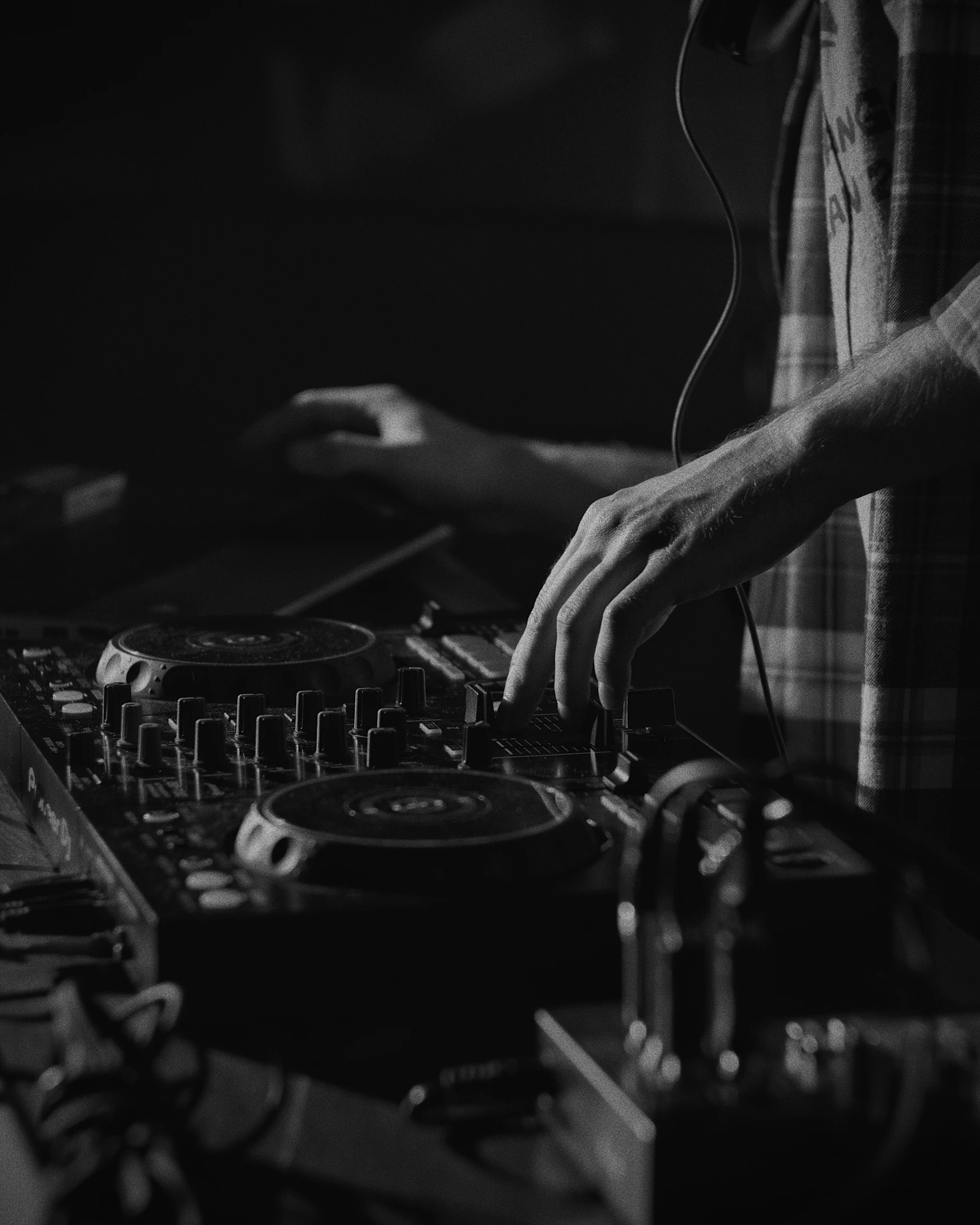 man is playing some musical on his decks