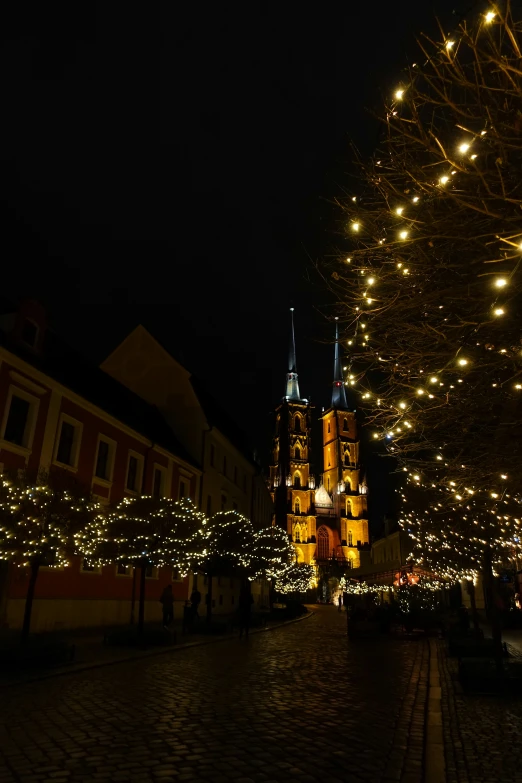 a lit up city street during the night