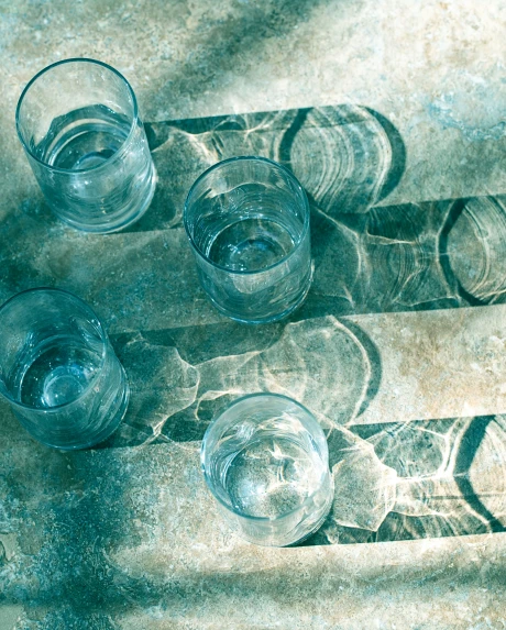a group of glasses sitting on top of a table
