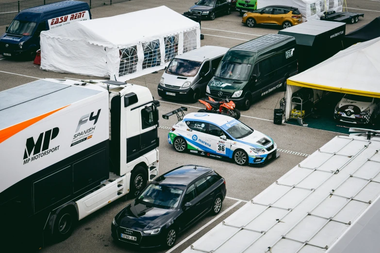 many cars are parked in a parking lot