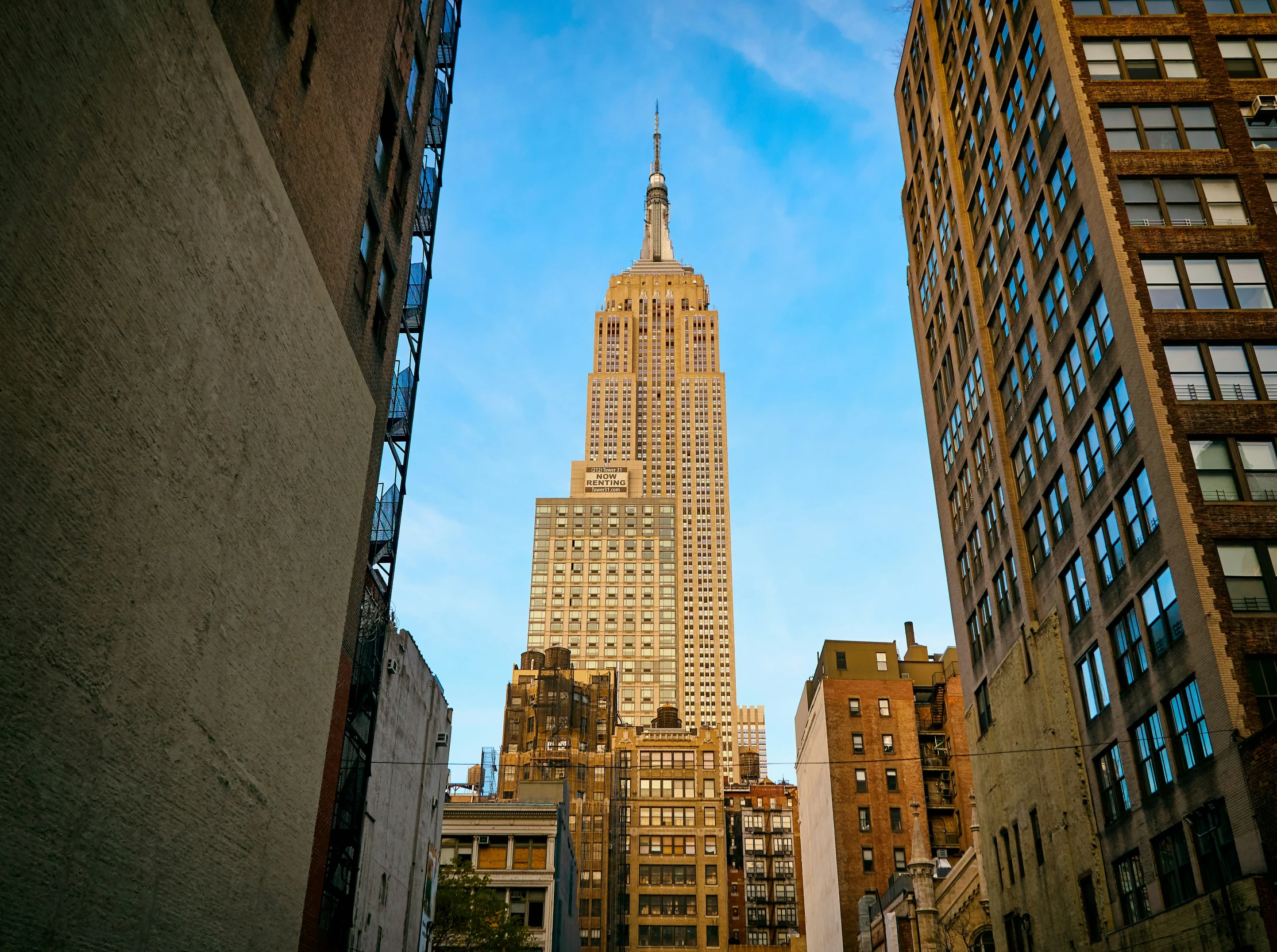 the top of a tall building towering over a city