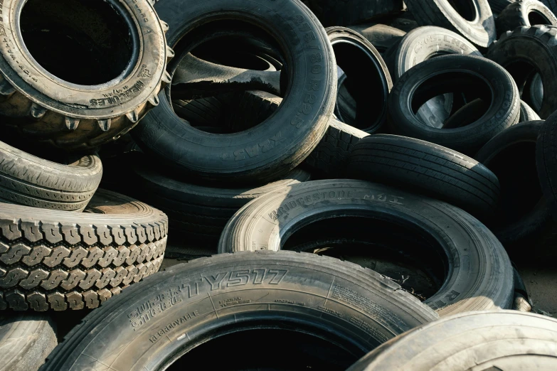 a pile of tires sit next to each other