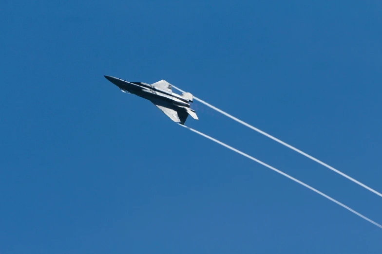 an airplane has two jets flying in the sky