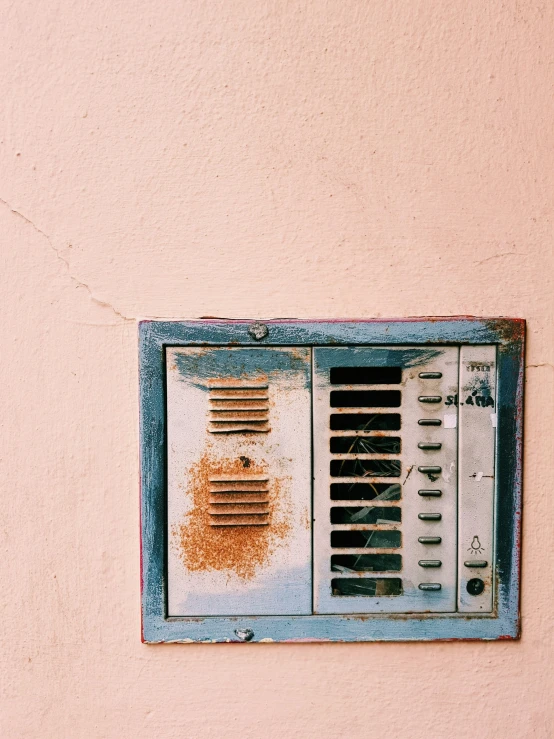 a close up view of a window that has a grill on it