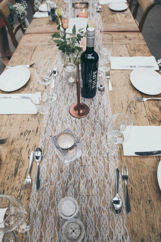 a table with plates and place settings is shown