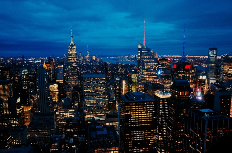 aerial view of a city with skyscrs at night