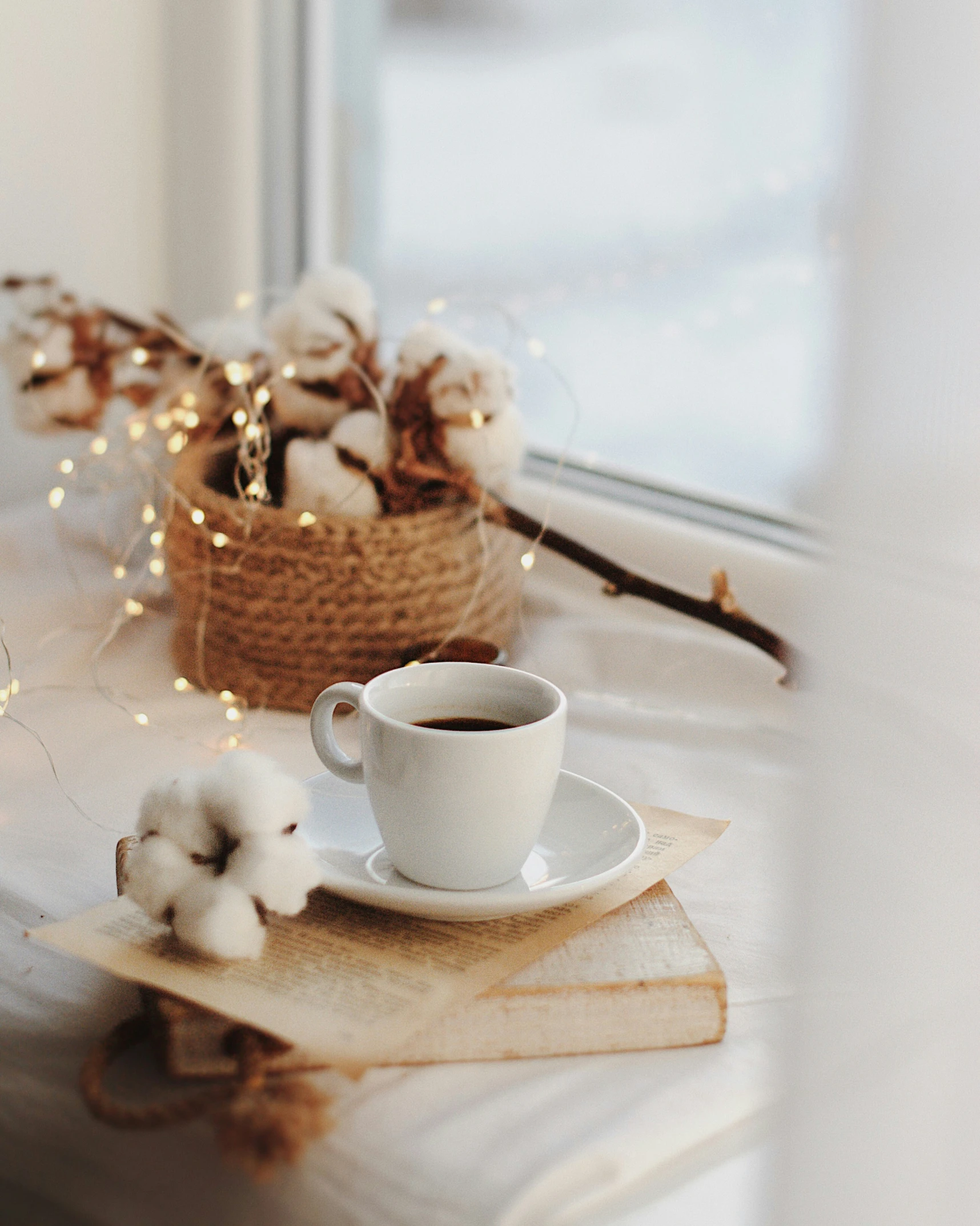 some cotton and a mug with a light bulb on the top