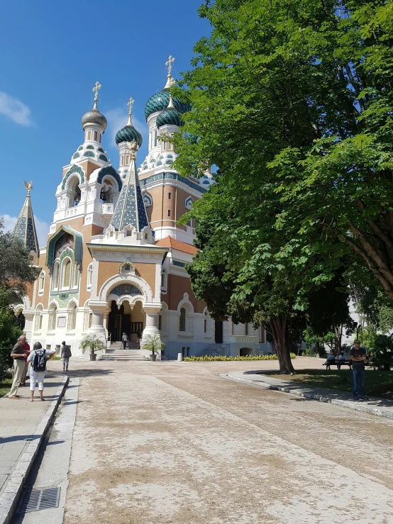 a large church with a clock tower is located