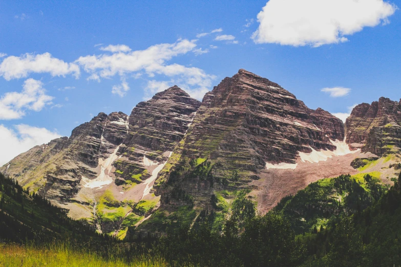 the view of a mountain side, from below