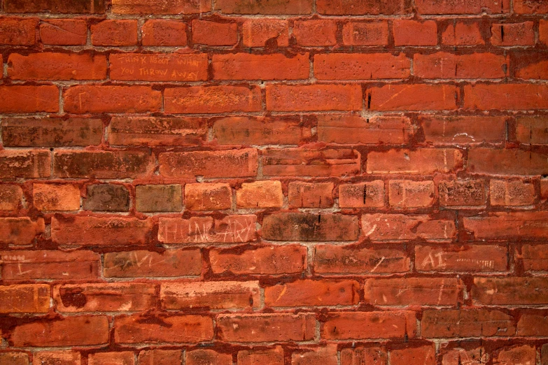 a brick wall that is not red in color