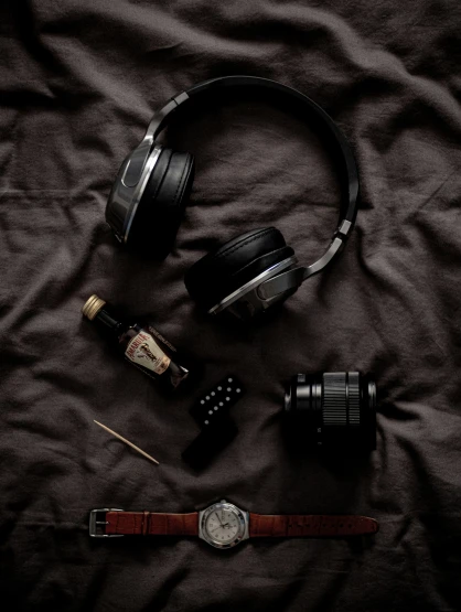 the headphones, cigars, watch and money are all part of this bed