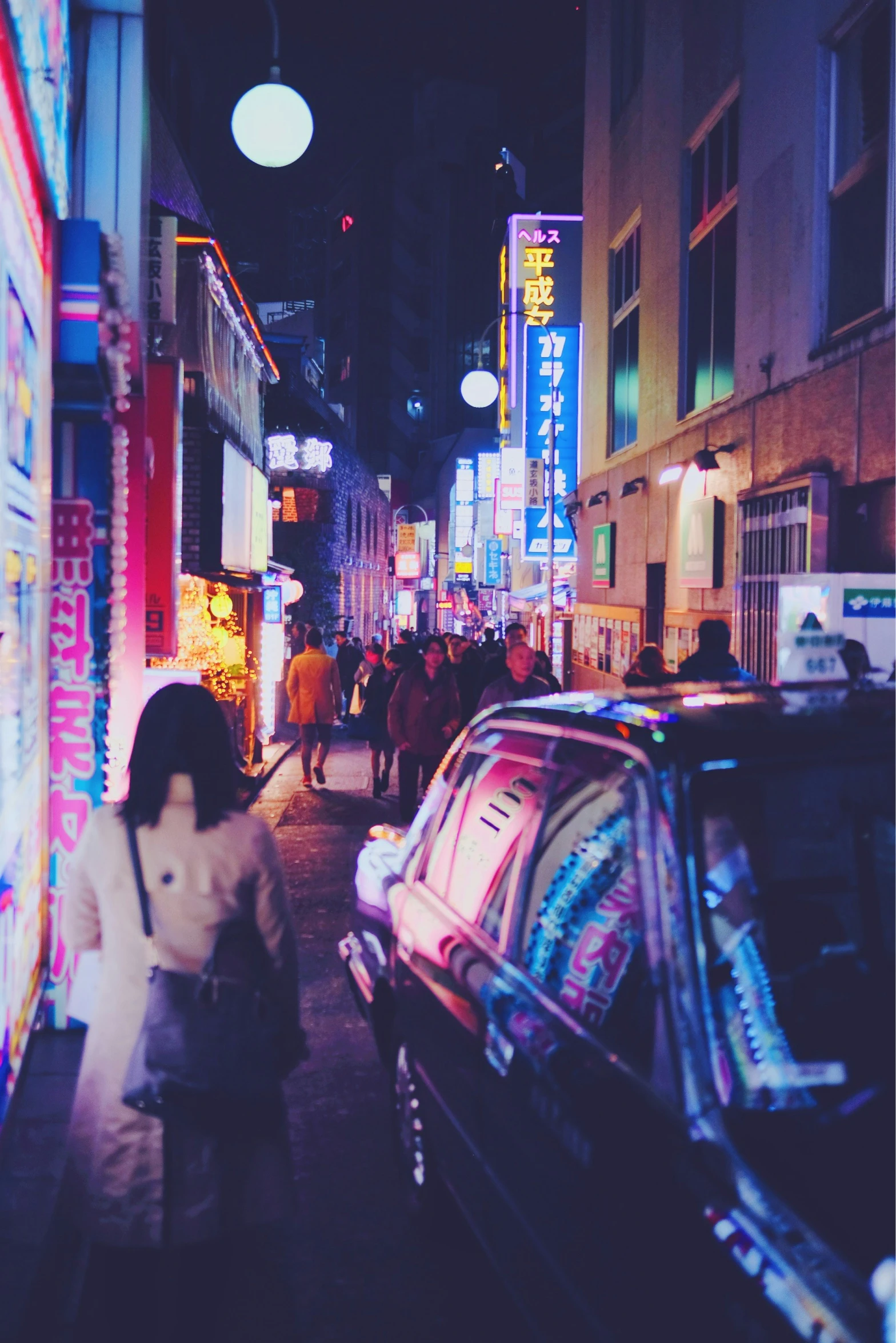 a city street lined with traffic lights and buildings