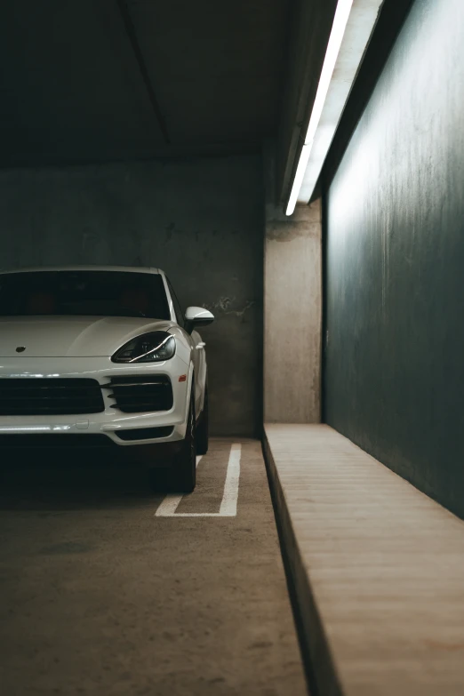 a sports car parked in an area next to a building