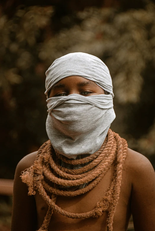 a woman with ids wrapped around her neck