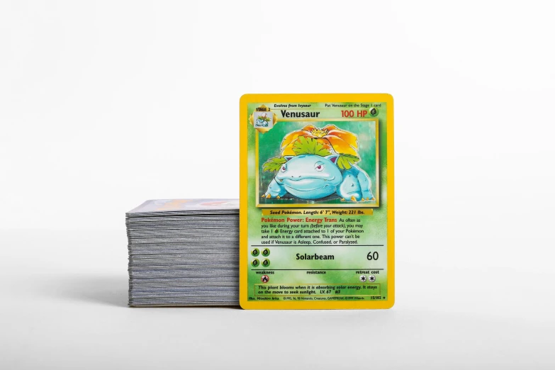 a yellow carton contains cards from pokemon's battle for the sun