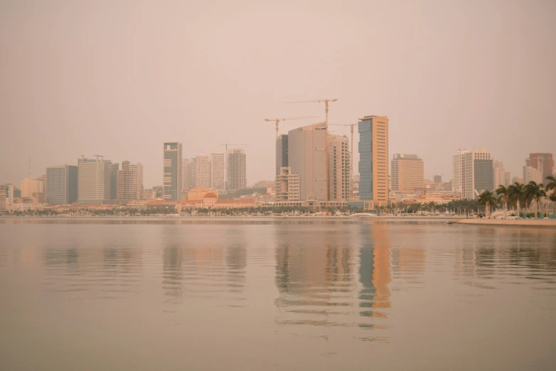 the tall buildings are located near the water