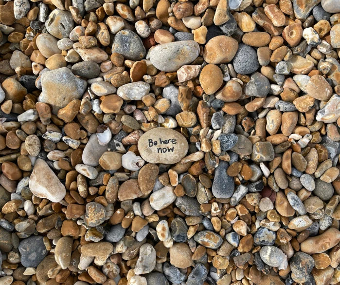 small rocks and gravel with the words be you engraved in the middle