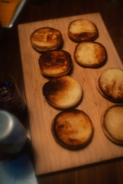 the biscuits are on the  board ready to be cooked