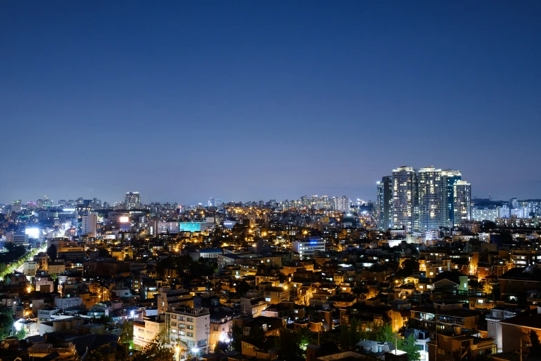 a city skyline lit up with lights at night