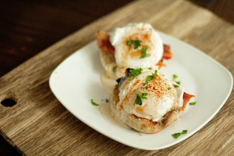 a plate with food sitting on top of a wooden table