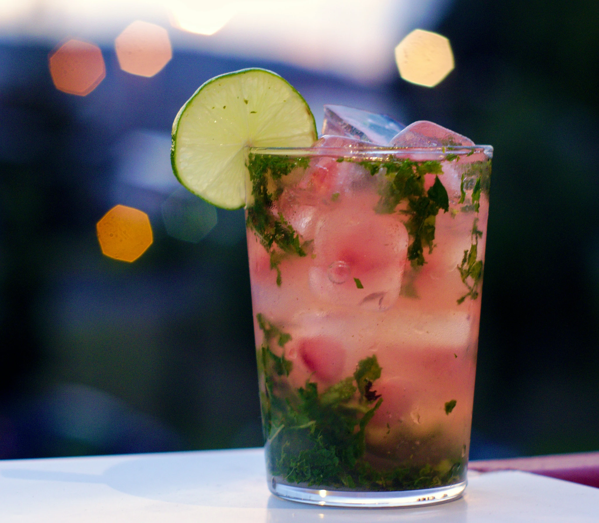 an alcoholic drink sits on a table, ready to be eaten