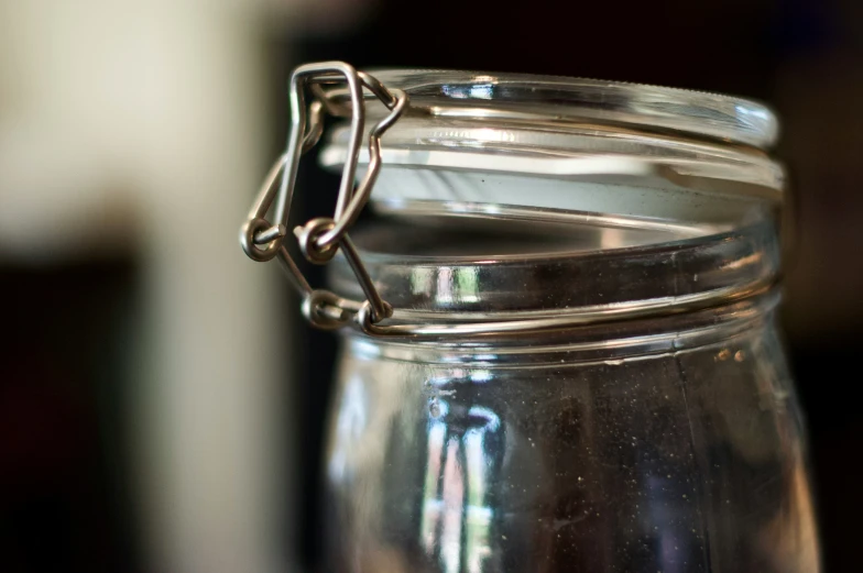 a metal string that has been secured to a mason jar