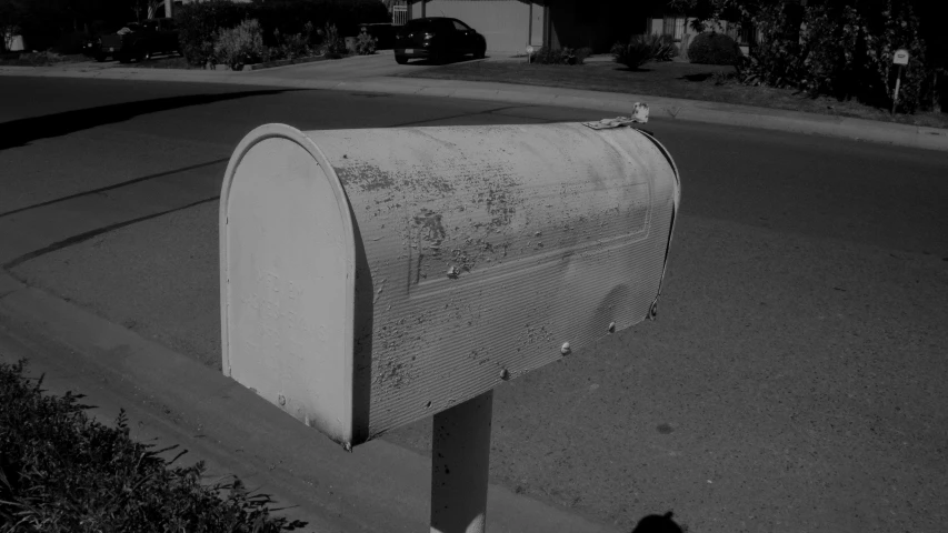 the light is shining on a mailbox