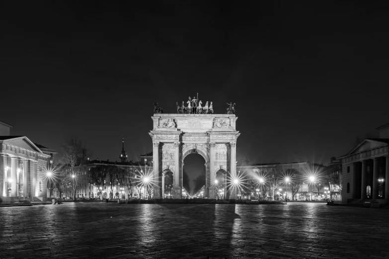 an open area with the tower in black and white