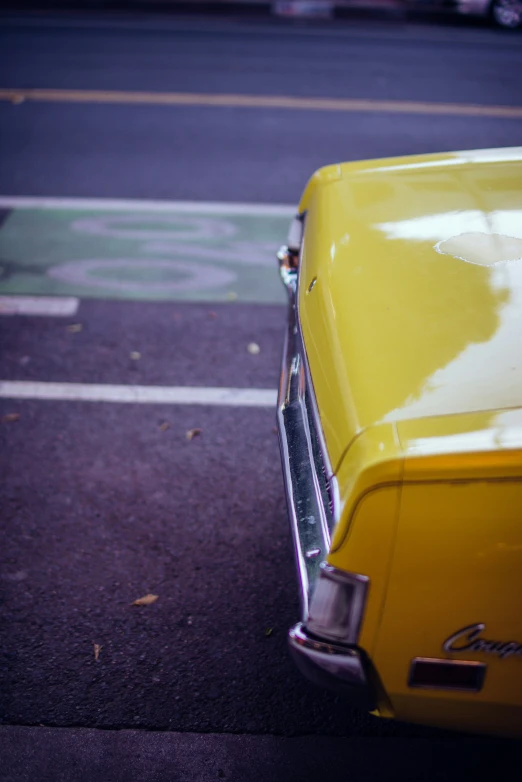 a close up view of an old yellow vehicle