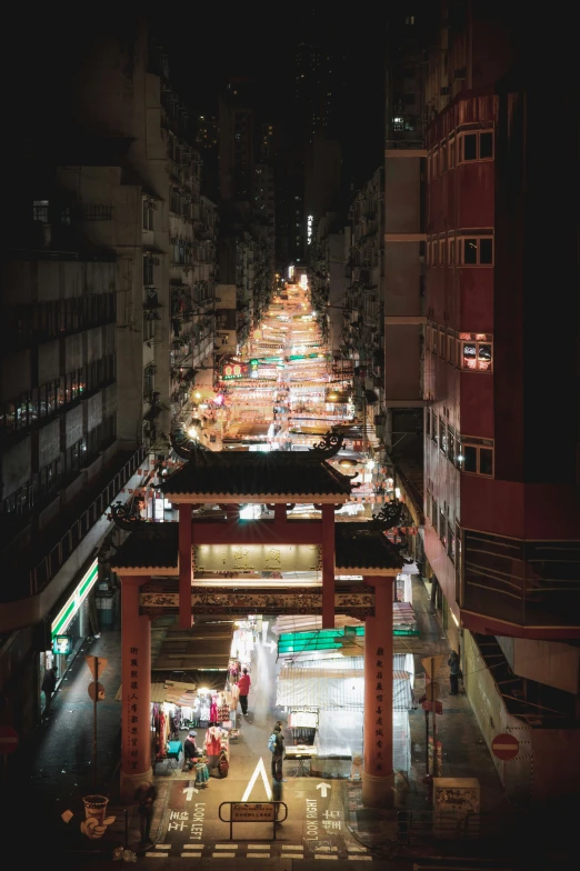 an overhead view of a city street during the night