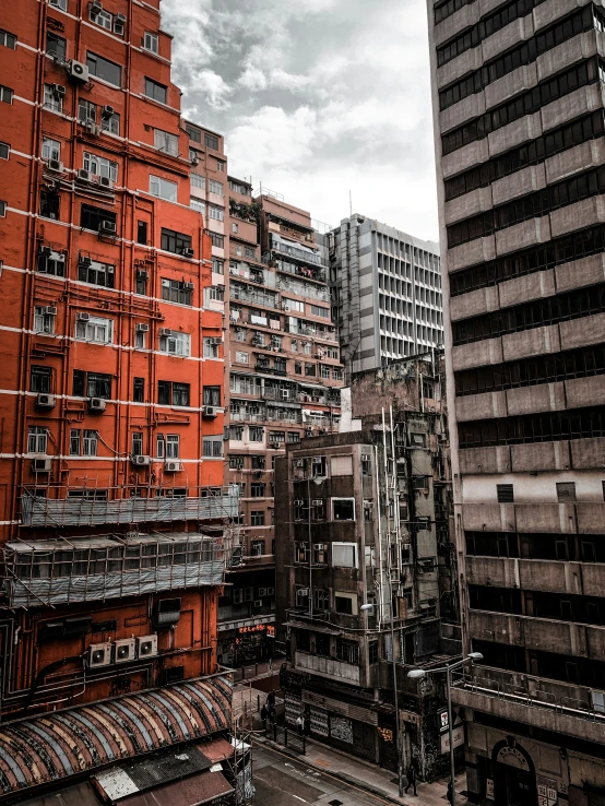 an aerial view of some buildings, some with balconies