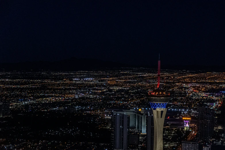 the view of a big city from above at night