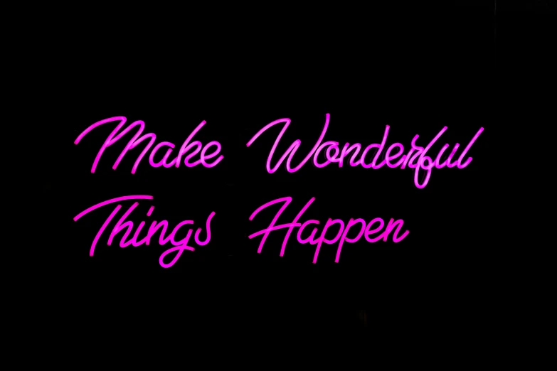 the words make wonderful things happen in pink and black