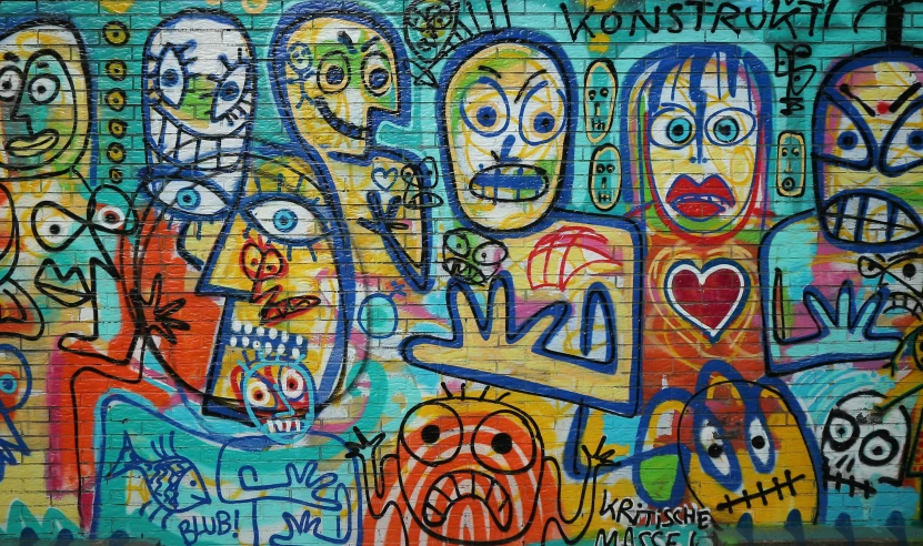 a painting on a wall with lots of colorful graffiti