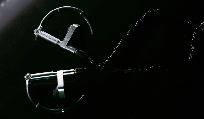 a black table with an assortment of metal items