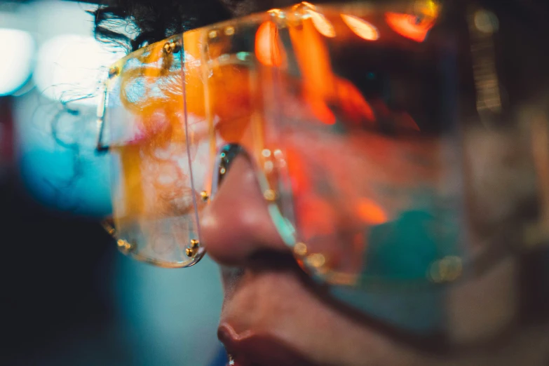 a close up of a person wearing glasses